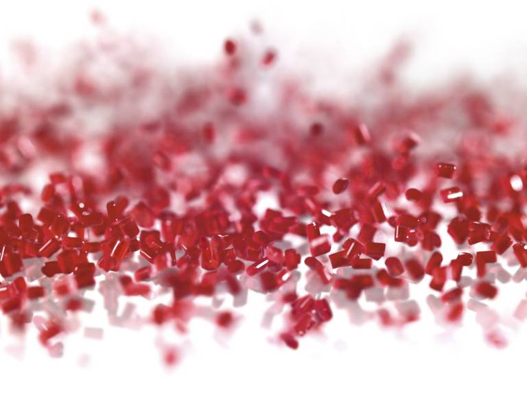 Motif with red plastic granules